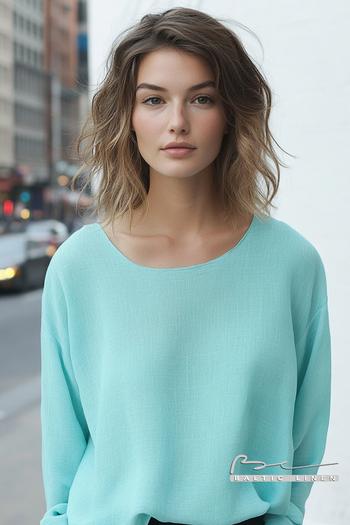 Turquoise linen top showcasing effortless style in New York fashion